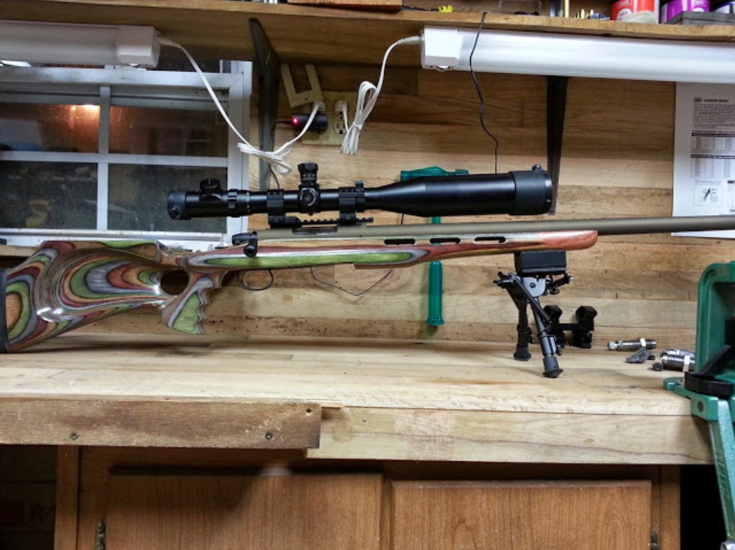 Hunting rifle and scope prepared for a Hog Hammers hunt